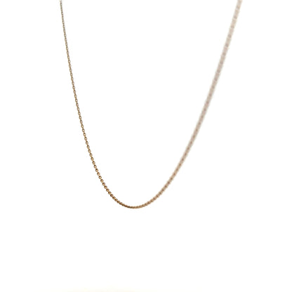 9ct yellow gold chain weighing 1.3g, unbranded jewelry piece with detailed links, shown on a neutral background.