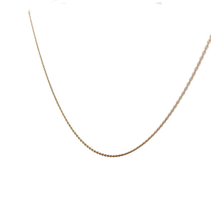 9ct yellow gold chain weighing 1.3g, unbranded, with a detailed close-up of its fine link design on a plain background.