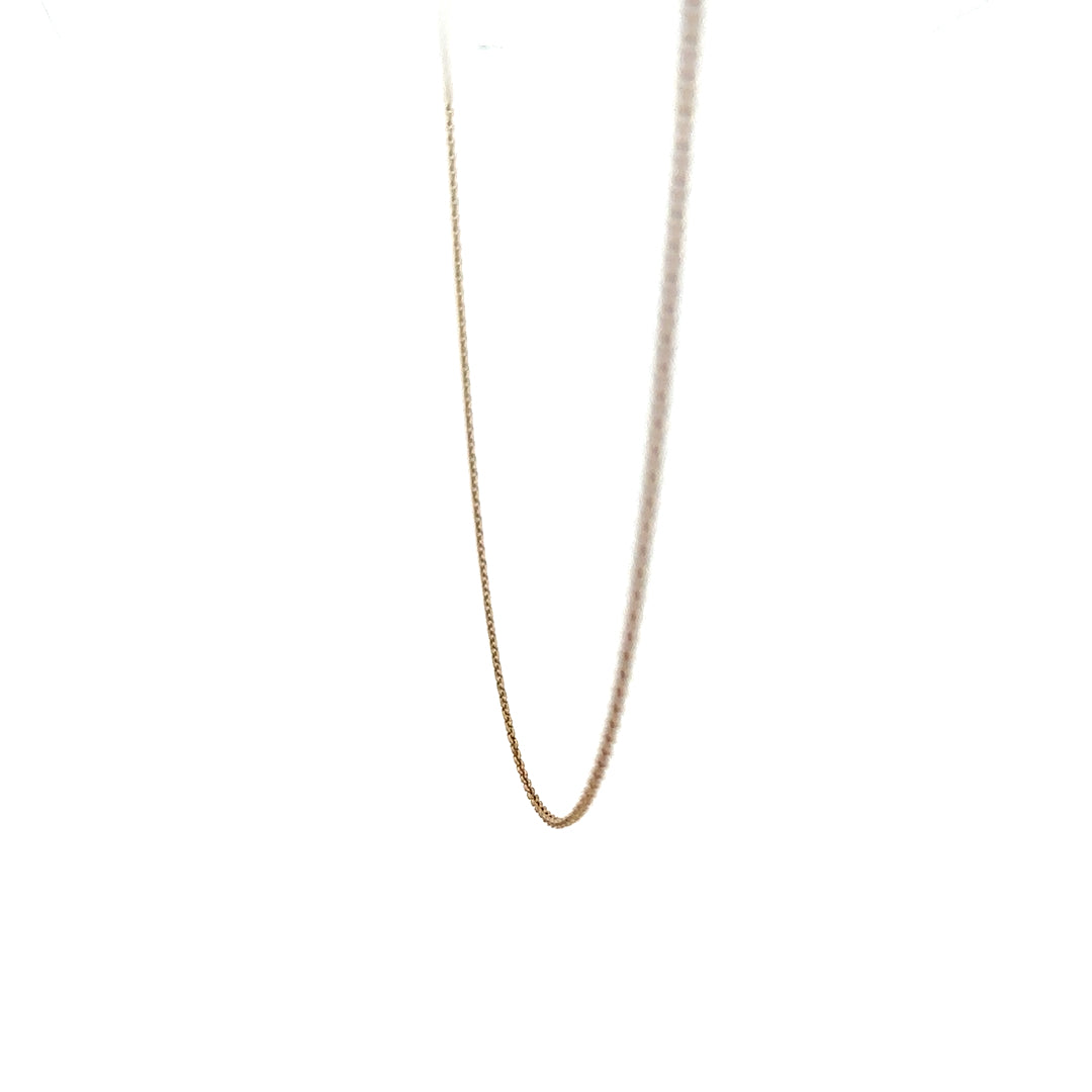 9ct yellow gold chain, unbranded, lightweight 1.3g, delicate jewelry chain shown in close-up with detailed links.