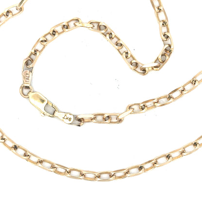 Unbranded 9ct yellow gold chain weighing 10.9g, shown with detailed links and classic design.