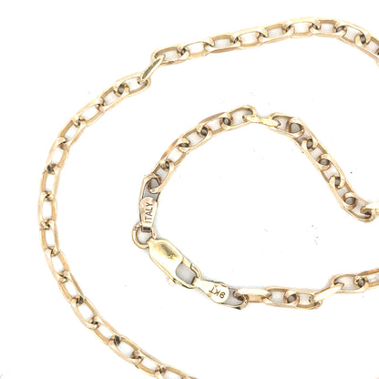 9ct yellow gold chain weighing 10.9g, unbranded, shown in a detailed close-up highlighting the chain's links and gold finish.