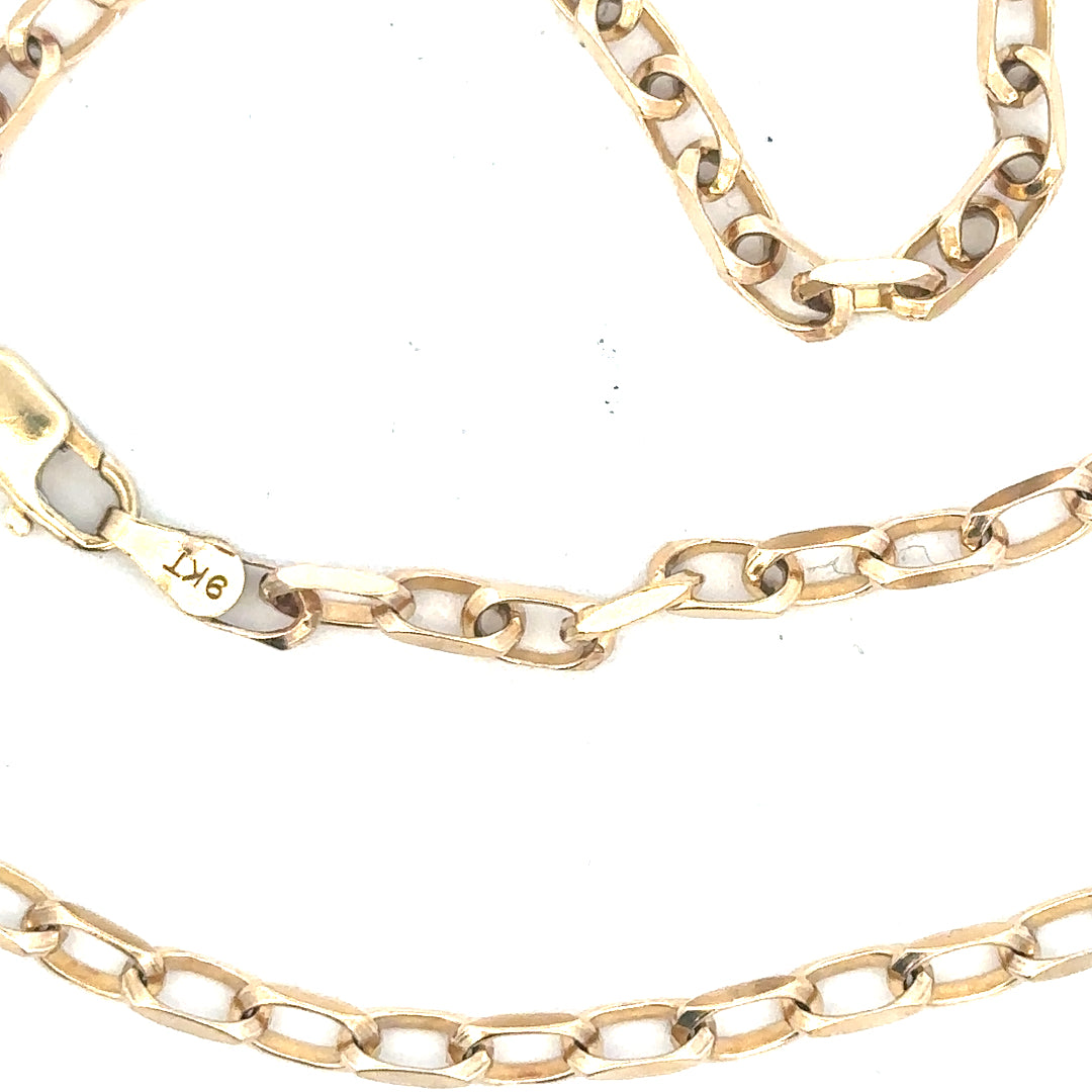 9ct yellow gold chain weighing 10.9g, unbranded, with detailed links visible, showcasing a classic jewelry chain style.