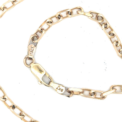 9ct yellow gold chain weighing 10.9g, unbranded jewelry chain with a classic link design, shown against a plain background.