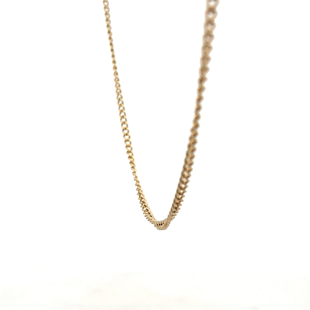 9ct yellow gold chain, unbranded, weighing 10.9g, featuring a classic link design, displayed on a neutral background.