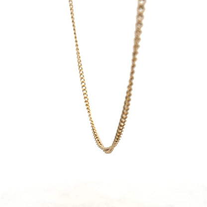 9ct yellow gold chain, unbranded, weighing 10.9g, featuring a classic link design, displayed on a neutral background.
