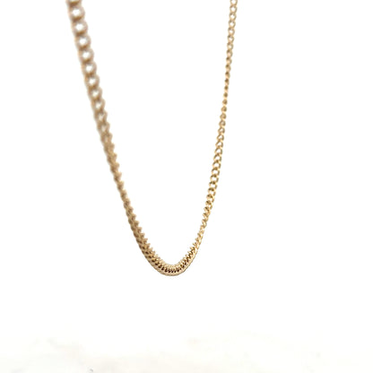 9ct yellow gold chain weighing 10.9g, unbranded, with a detailed close-up of the chain links on a plain background.