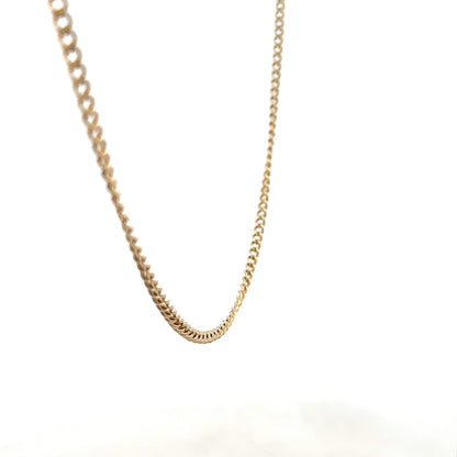 9ct yellow gold chain weighing 10.9g, unbranded jewelry with a classic chain design, shown in close-up detail.