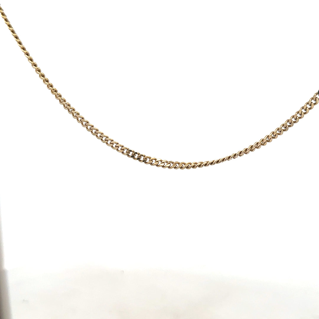 9ct yellow gold chain weighing 11g, unbranded jewelry chain with a classic link design, shown in a detailed product image.