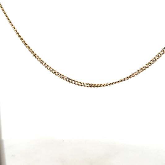9ct yellow gold chain weighing 11g, unbranded jewelry chain with a classic link design, shown in a detailed product image.