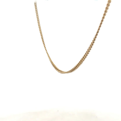9ct yellow gold chain, 11g, unbranded, with a classic link design, showcased in a close-up image.