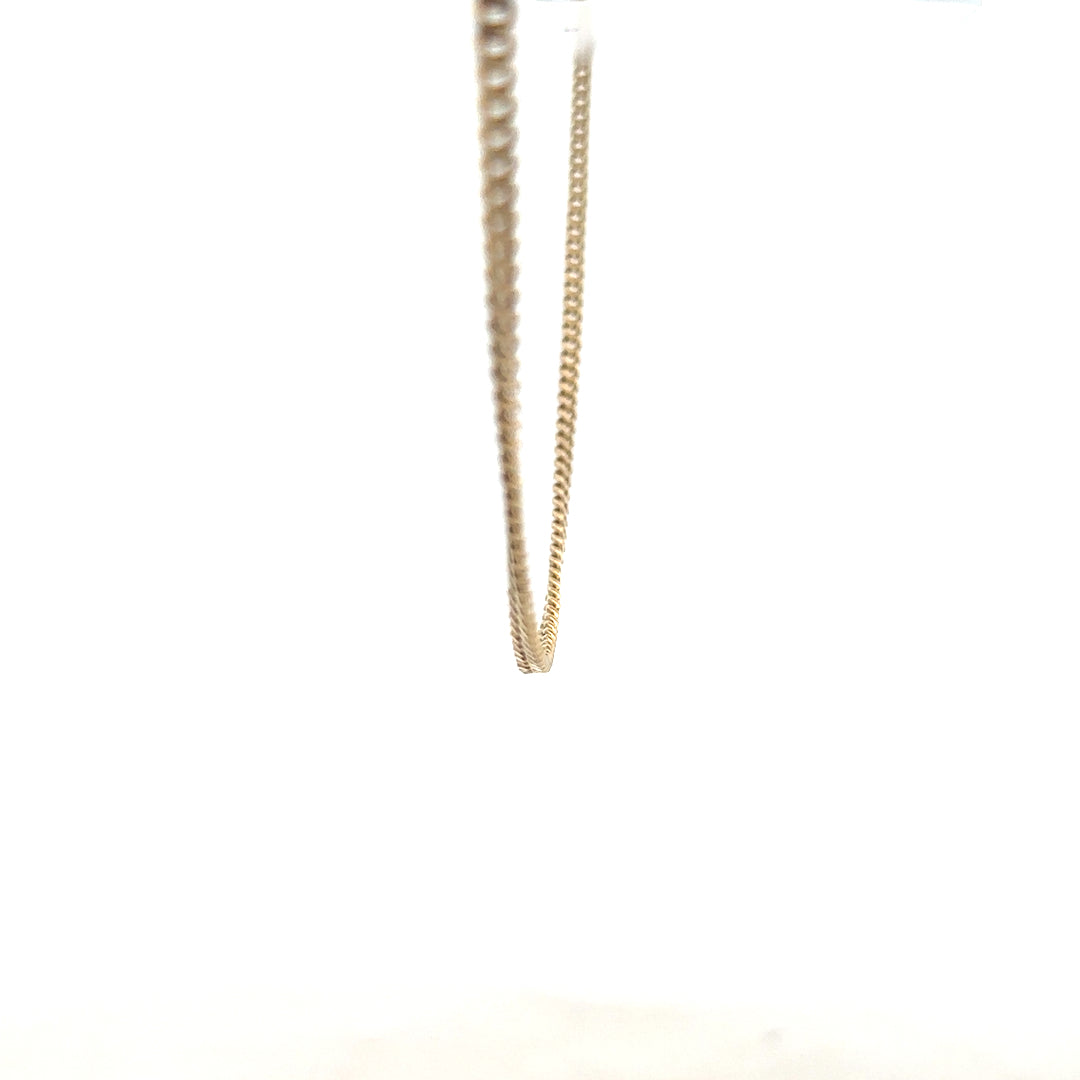 9ct yellow gold chain weighing 11g, unbranded jewelry chain with a classic design, shown in a close-up image.