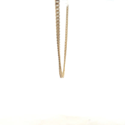 9ct yellow gold chain weighing 11g, unbranded jewelry chain with a classic design, shown in a close-up image.