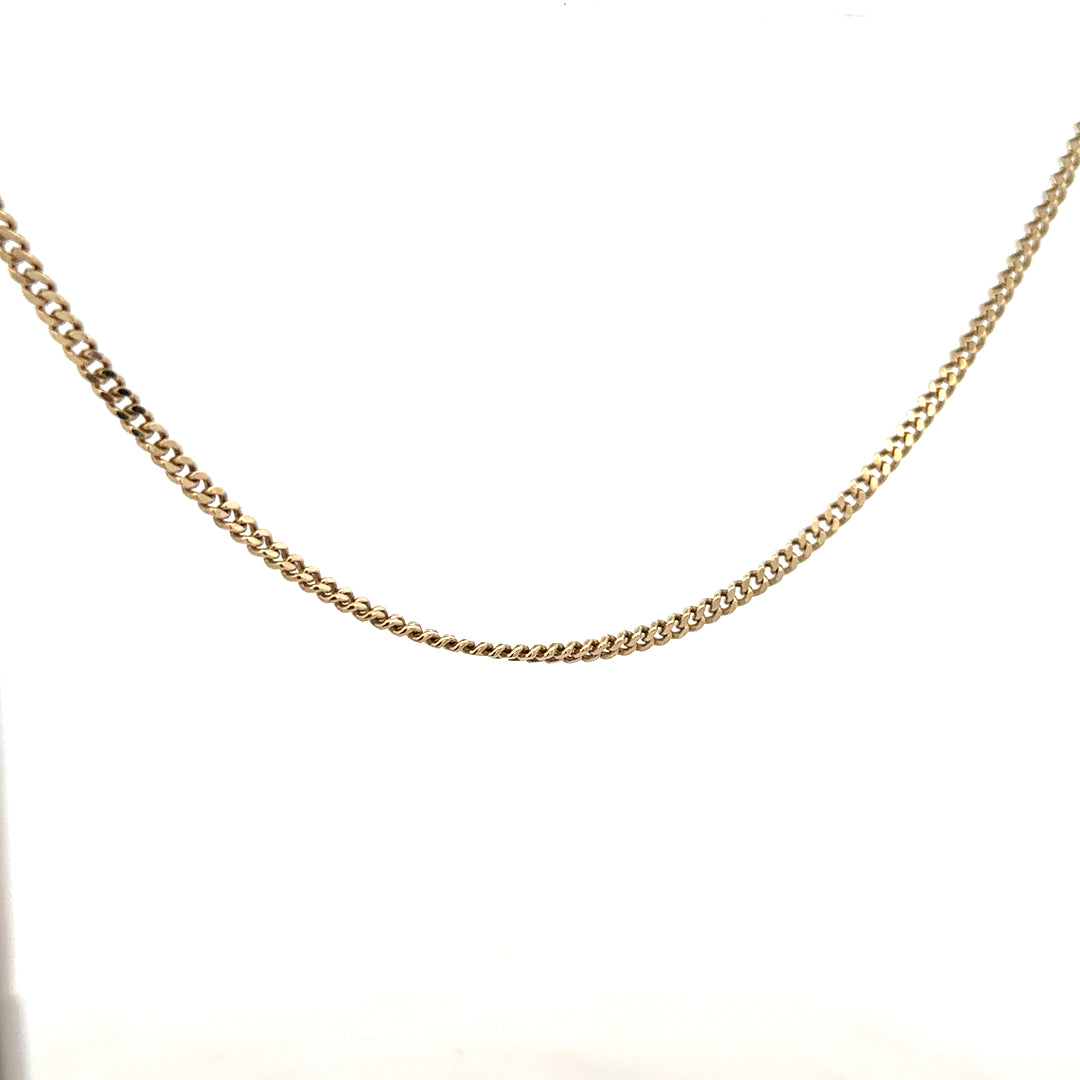9ct yellow gold chain weighing 11g, unbranded, with a classic link design, shown in a close-up image.
