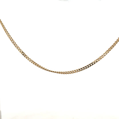 9ct yellow gold chain weighing 11g, unbranded jewelry chain with a classic link design, shown in a detailed product image.