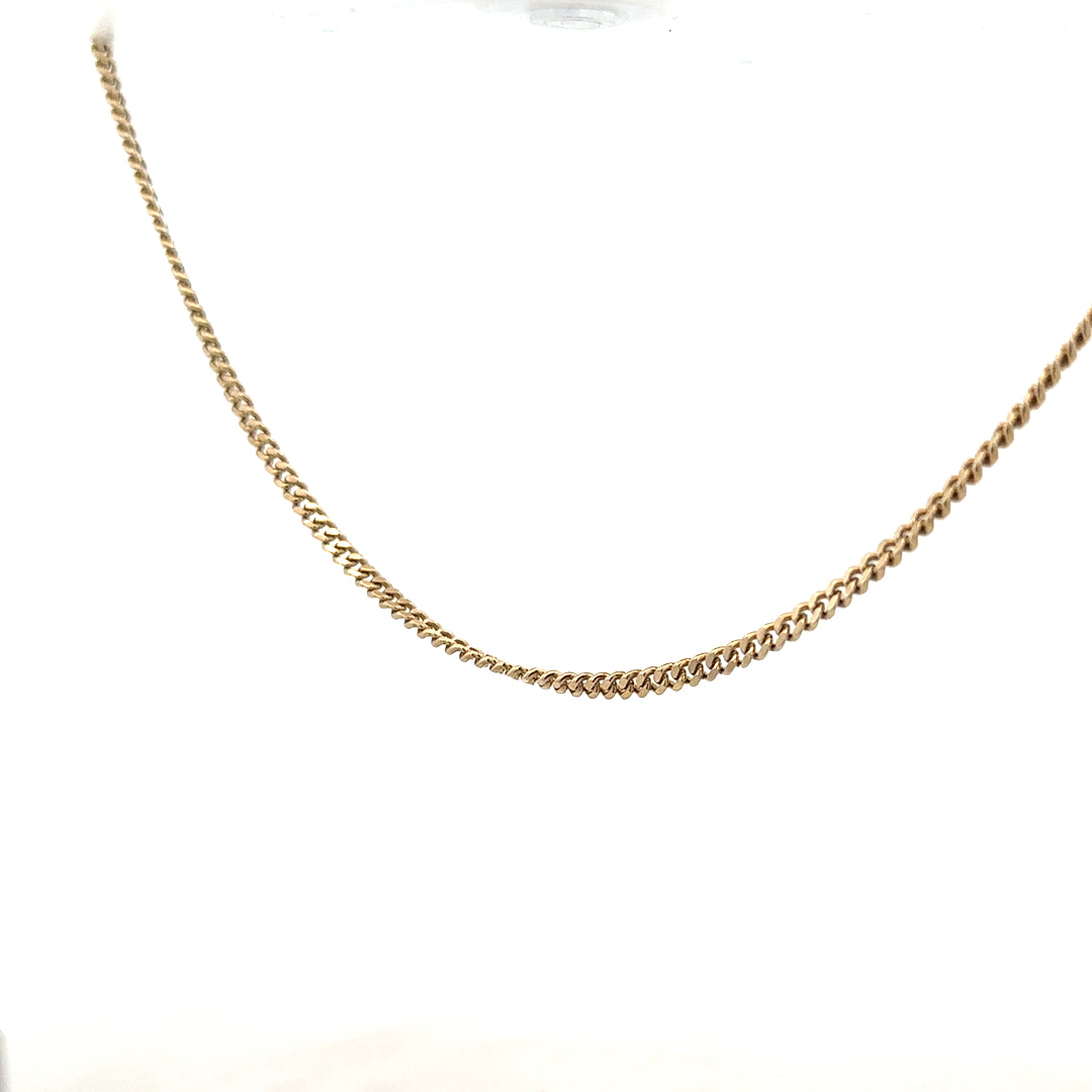 9ct yellow gold chain with 11g weight, unbranded, shown in a close-up image highlighting the chain's links and golden shine.