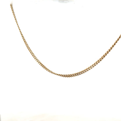 9ct yellow gold chain with 11g weight, unbranded, shown in a close-up image highlighting the chain's links and golden shine.