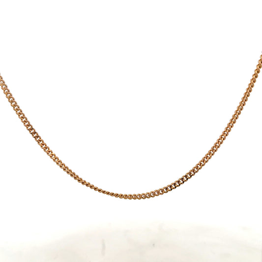 9ct yellow gold chain weighing 12.7g, unbranded, with a detailed close-up of the elegant jewelry chain.