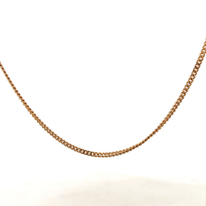 9ct yellow gold chain weighing 12.7g, unbranded jewelry chain with a polished finish, detailed close-up of the gold link design.