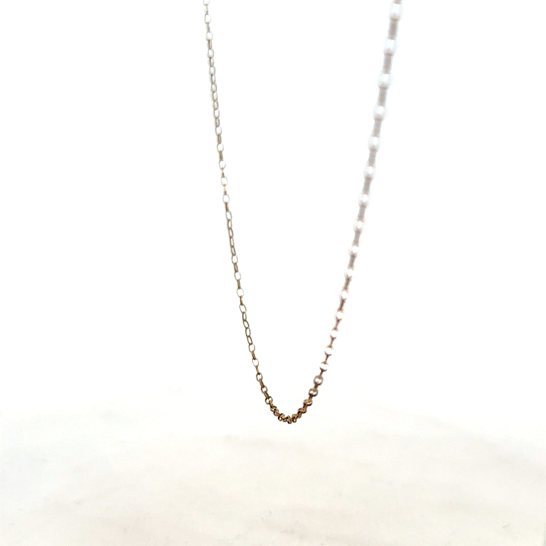9ct yellow gold chain with a 1g weight, showcasing a delicate and polished jewelry chain with a classic design.