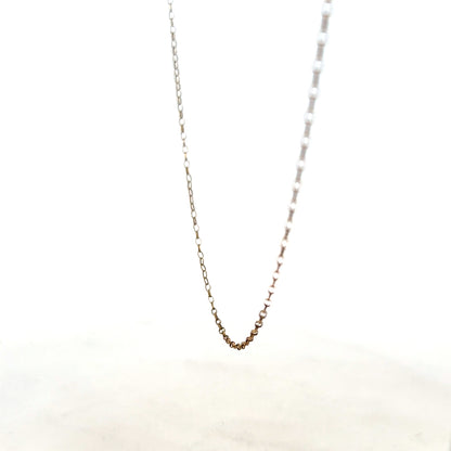 9ct yellow gold chain with a 1g weight, showcasing a delicate and polished jewelry chain with a classic design.