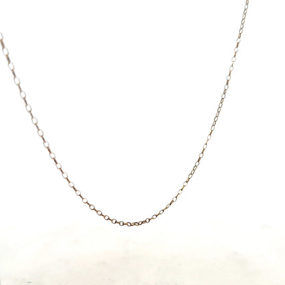 9ct yellow gold chain with a delicate link design, weighing 1g, showcasing the unbranded jewelry style.