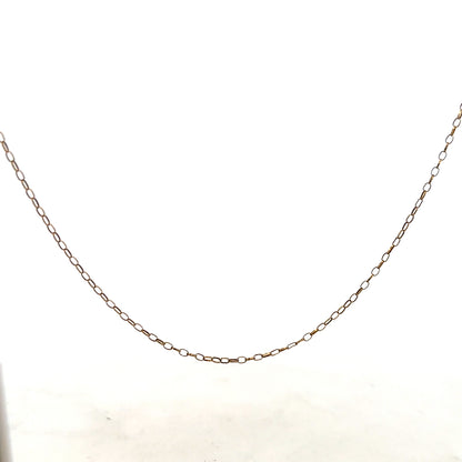 9ct yellow gold chain with a 1g weight, showcasing a delicate and shiny jewelry chain design.