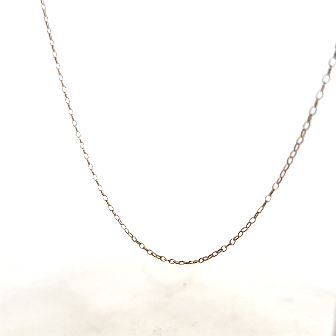 9ct yellow gold chain, 1g, unbranded jewelry piece featuring a classic chain design, shown in a close-up image.