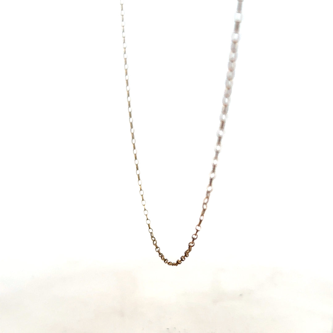 9ct yellow gold chain with a delicate design, weighing 1g, showcased against a neutral background.