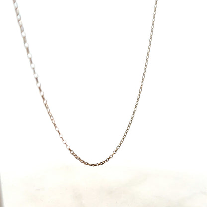 9ct yellow gold chain with a delicate design, weighing 1 gram, showcased in a close-up view highlighting its fine craftsmanship.