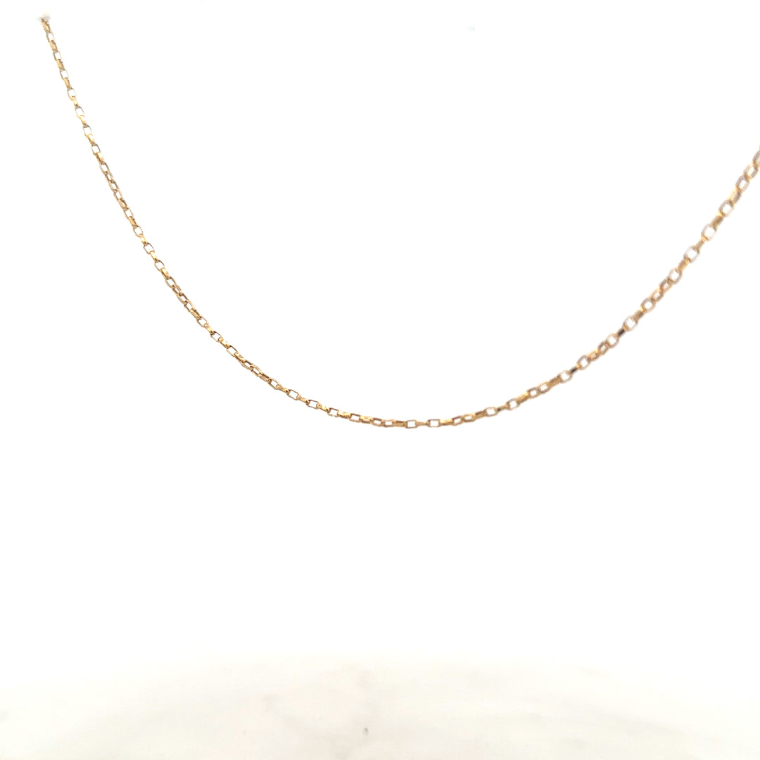 9ct yellow gold chain weighing 2.2g, unbranded, showcasing a delicate and shiny jewelry chain with detailed links.