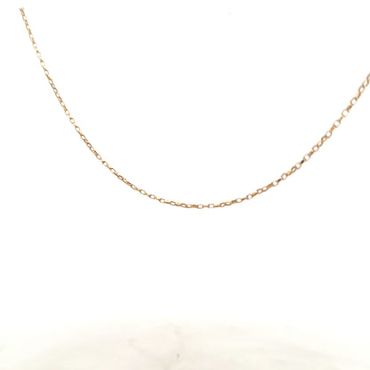 9ct yellow gold chain weighing 2.2g, unbranded, showcasing a delicate and shiny jewelry chain with detailed links.
