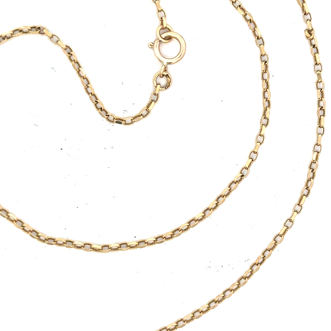 Unbranded 9ct yellow gold chain, 2.4g, featuring a delicate design, displayed on a neutral background.