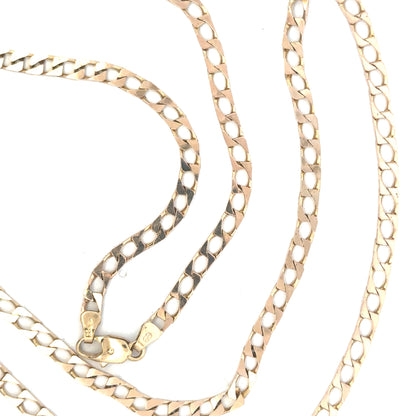 9ct yellow gold chain weighing 20.9g, unbranded, with a detailed close-up of the chain links on a plain background.