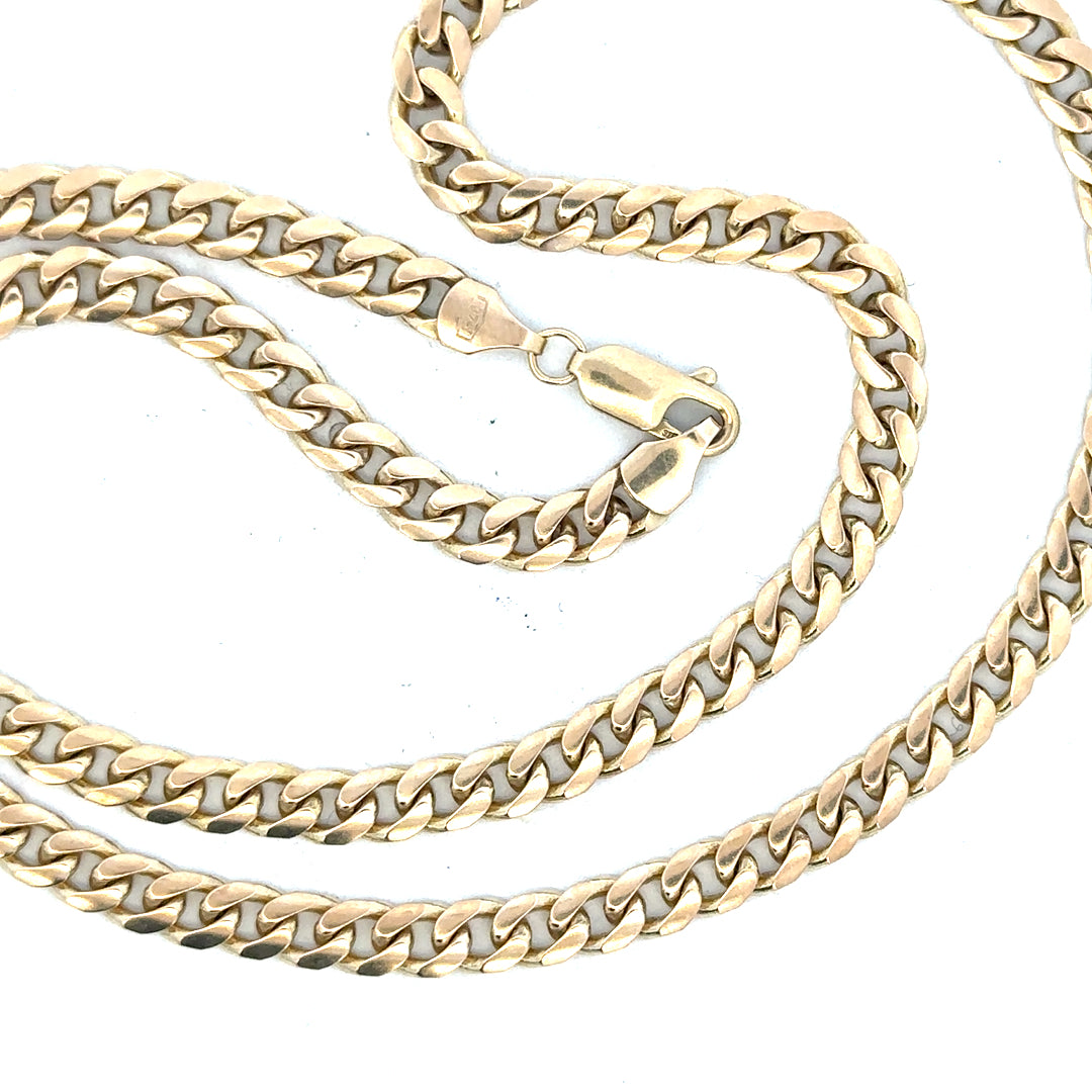 Yellow gold chain weighing 22.7g, unbranded 9ct gold jewelry with intricate link design, shown on a plain background.