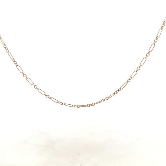 9ct yellow gold chain weighing 3.3g, unbranded, with a classic link design, shown in a close-up image.