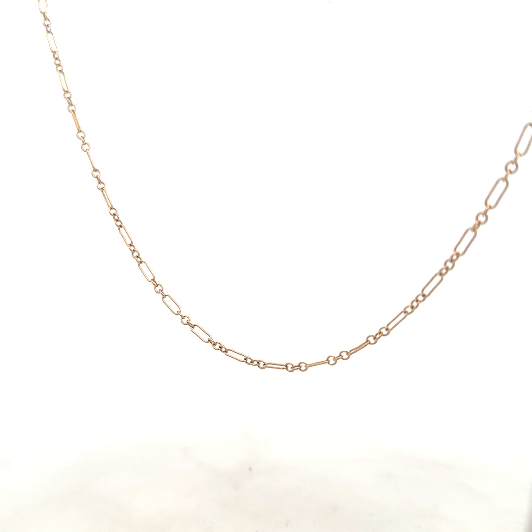 9ct yellow gold chain, unbranded, weighing 3.3g, shown in a close-up image highlighting the chain's fine links.