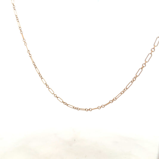 9ct yellow gold chain, unbranded, weighing 3.3g, shown in a close-up image highlighting the chain's fine links.