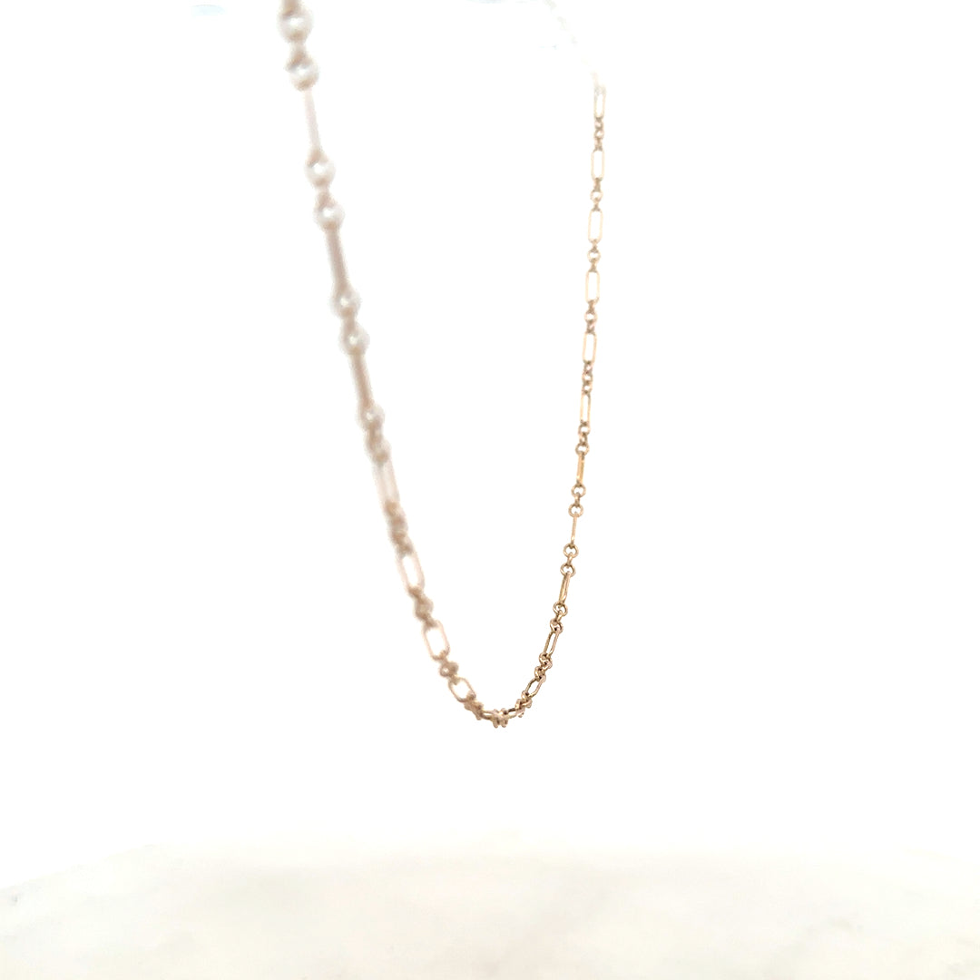 9ct yellow gold chain weighing 3.3g, unbranded jewelry chain with a classic design, shown in a close-up image.