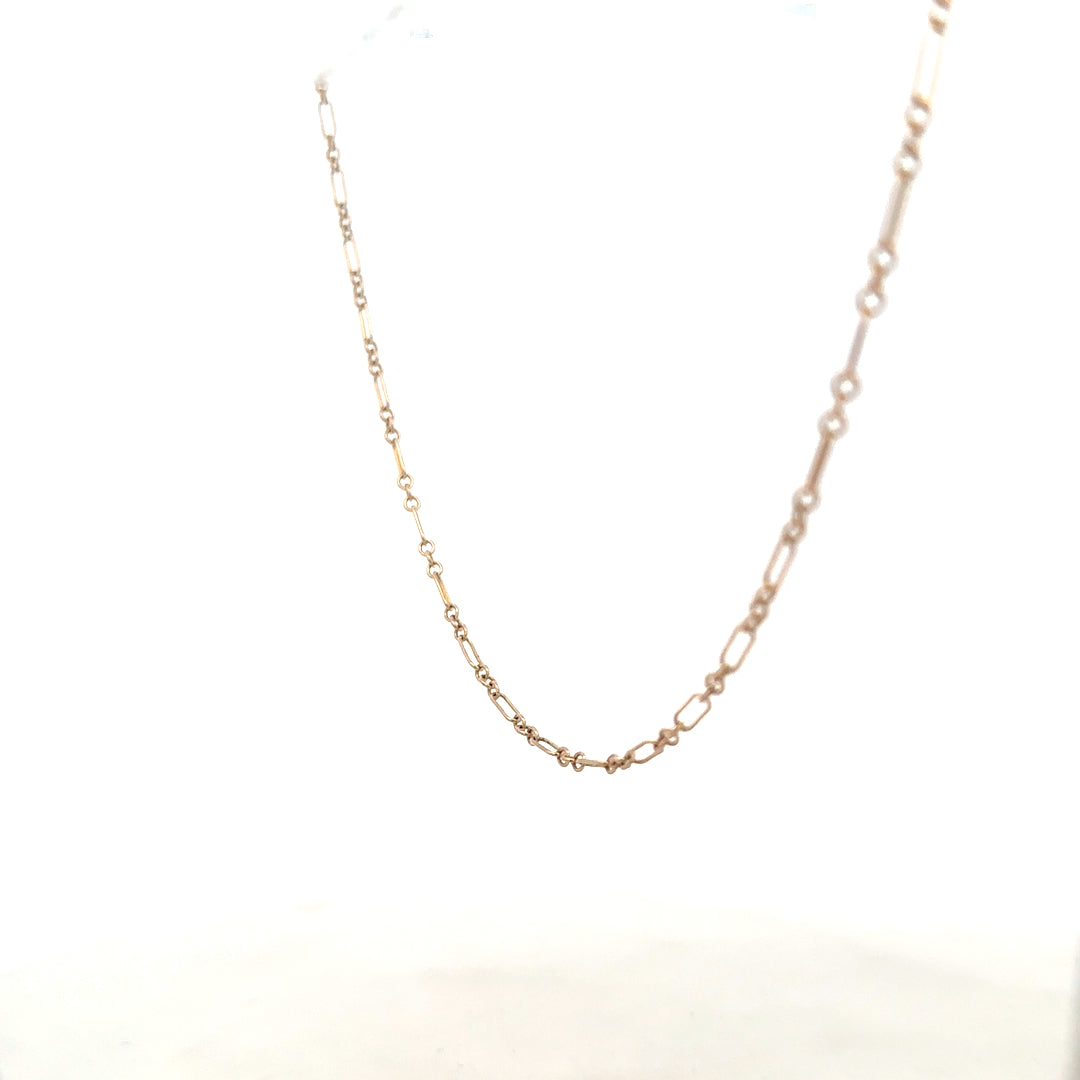 9ct yellow gold chain weighing 3.3g, unbranded jewelry accessory with a classic chain design, shown in close-up image.