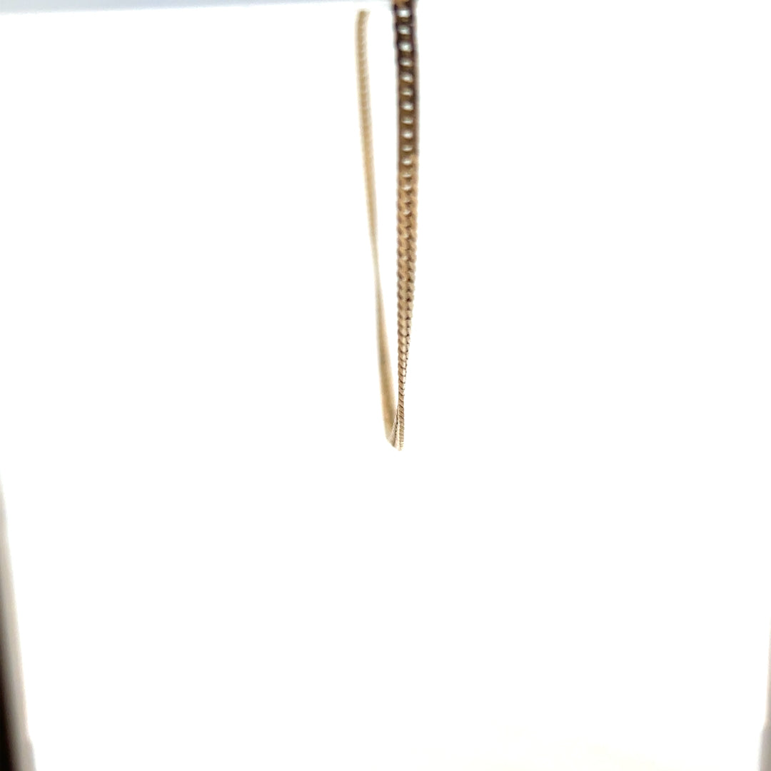 9ct yellow gold chain weighing 4.6g, unbranded jewelry chain with a polished finish and intricate link design.