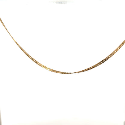 9ct yellow gold chain weighing 4.6g, unbranded jewelry chain with a classic design, shown in close-up detail.