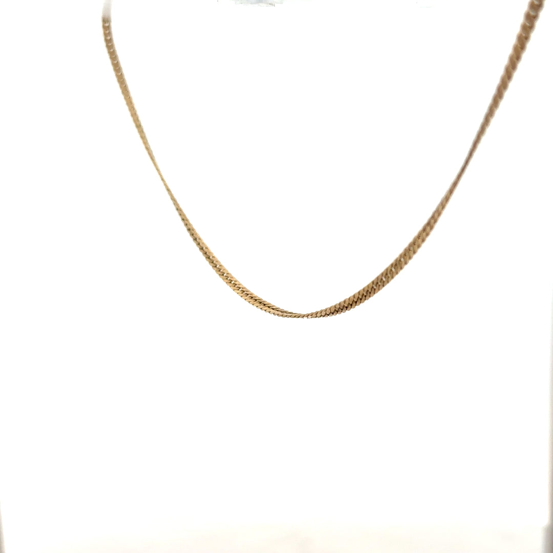 9ct yellow gold chain weighing 4.6g, unbranded, featuring a classic chain link design, shown in a close-up image.