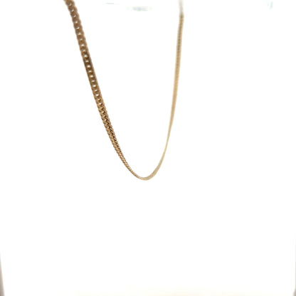 9ct yellow gold chain weighing 4.6g, unbranded jewelry chain with a classic design, shown in close-up detail.