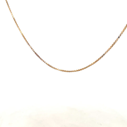9ct yellow gold chain weighing 6.1g, unbranded, with a classic link design, shown in a close-up on a plain background.