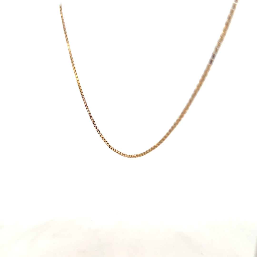 9ct yellow gold chain weighing 6.1g, unbranded jewelry chain with a classic design, displayed on a white background.