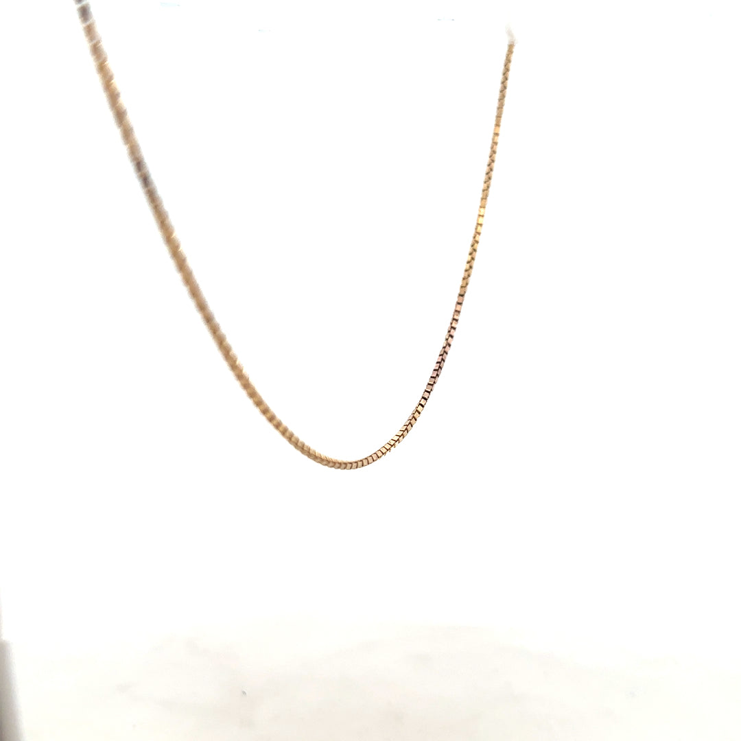 9ct yellow gold chain weighing 6.1g, unbranded, with a classic link design, displayed on a neutral background.