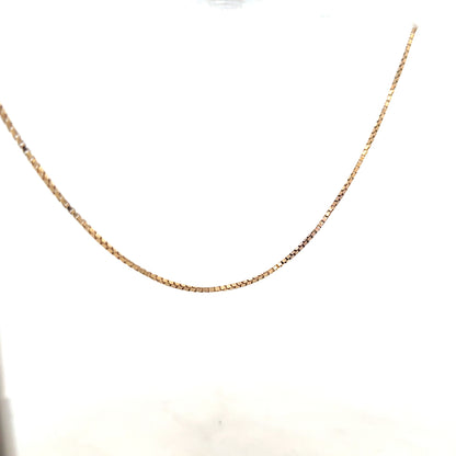 9ct yellow gold chain weighing 6.1g, unbranded, with a classic link design, displayed against a plain background.