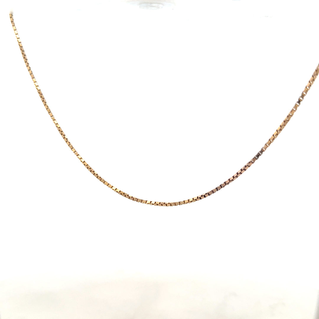 9ct yellow gold chain weighing 6.1g, unbranded, featuring a classic design with a polished finish, displayed against a neutral background.