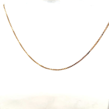 9ct yellow gold chain weighing 6.1g, unbranded, featuring a classic design with a polished finish, displayed against a neutral background.
