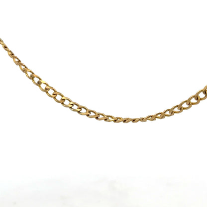 9ct yellow gold chain weighing 7.4g, unbranded jewelry chain with a classic design, shown in a close-up view.